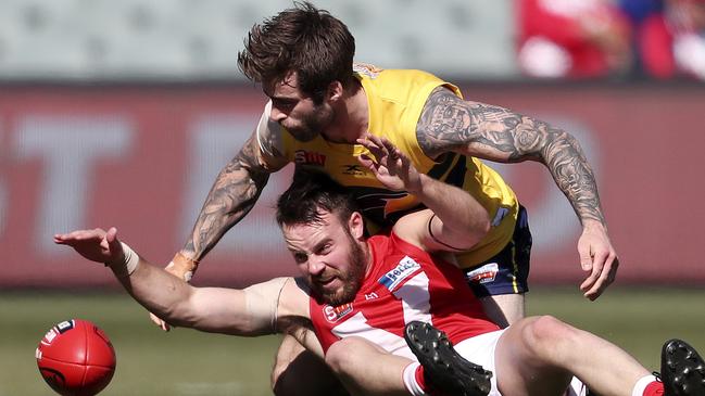 Max Thring was hungry for the action, beating Jack Firns to the ball. Picture: Sarah Reed