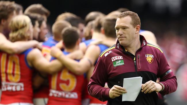 Justin Leppitsch leaves the field after speaking to the Lions for the last time in 2016. Picture: Scott Barbour/Getty Images