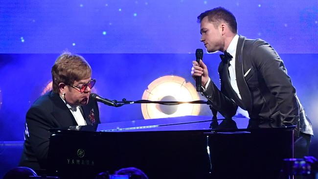 Elton John and Taron Egerton performing during the Rocketman Gala Party at the Cannes Film Festival. Picture: Getty