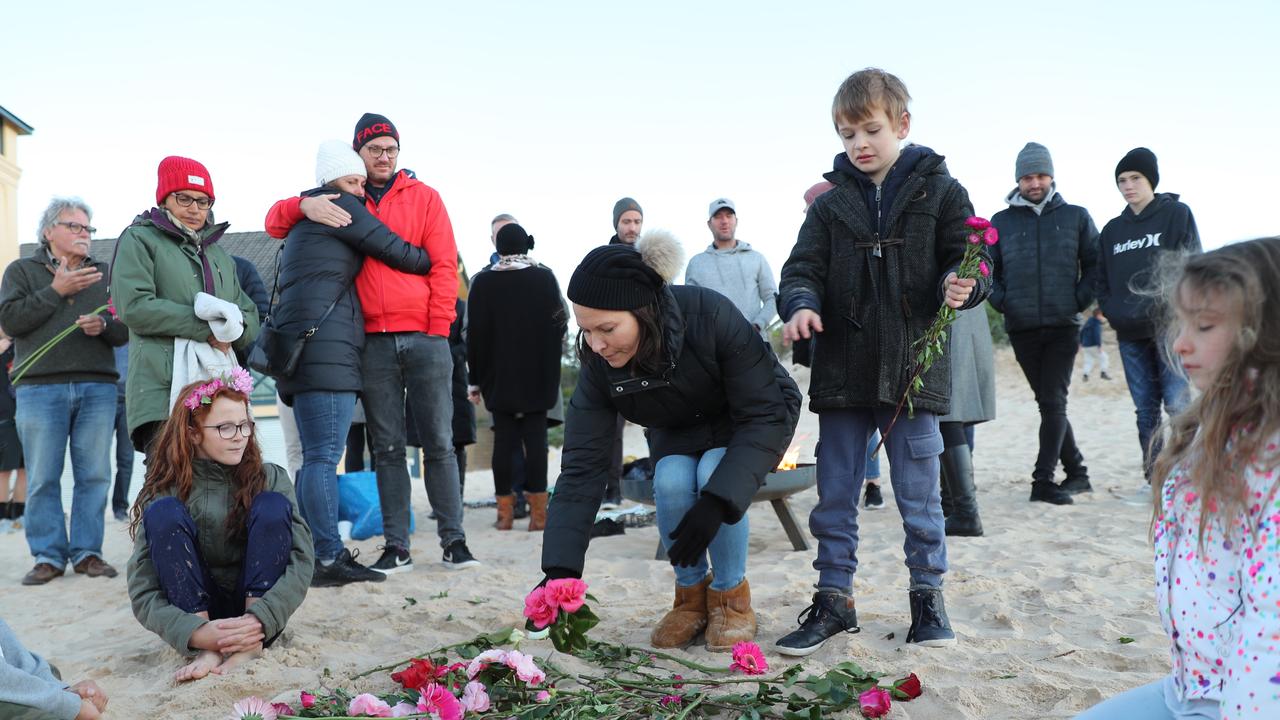 Friends of Justine Ruszczyk at a 2 year memorial on Freashwater beach. Picture: John Grainger