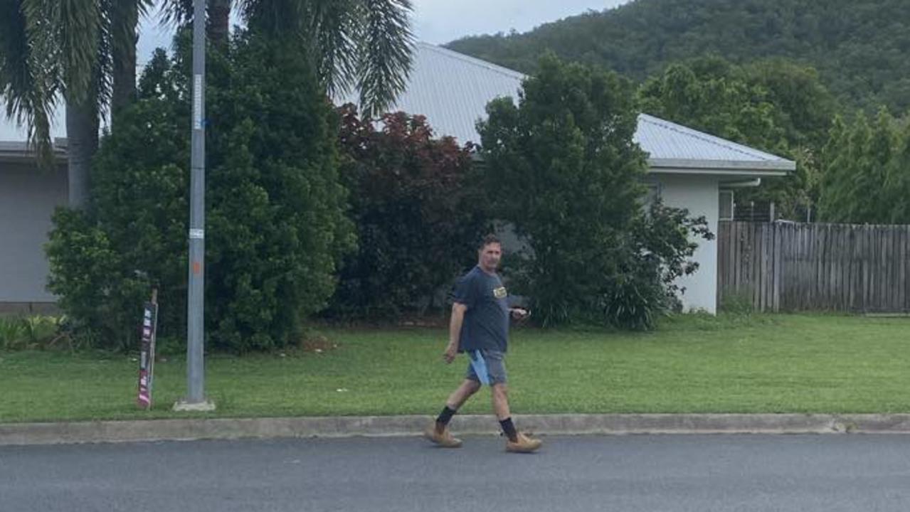 Cairns business identity Greg Nucifora is seen placing a corflute near mayor Bob Manning's home in Gordonvale earlier this year. Picture: Supplied.