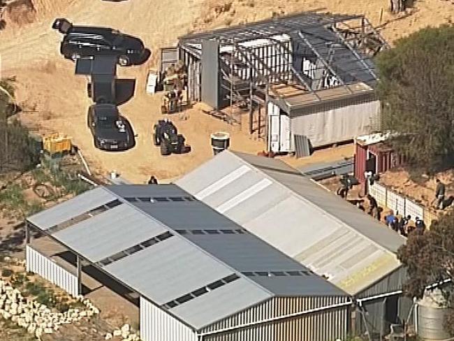 Police search a property linked to the Hells Angels Bikie club at Ponde, South Australia today . Picture; 7 News Adelaide