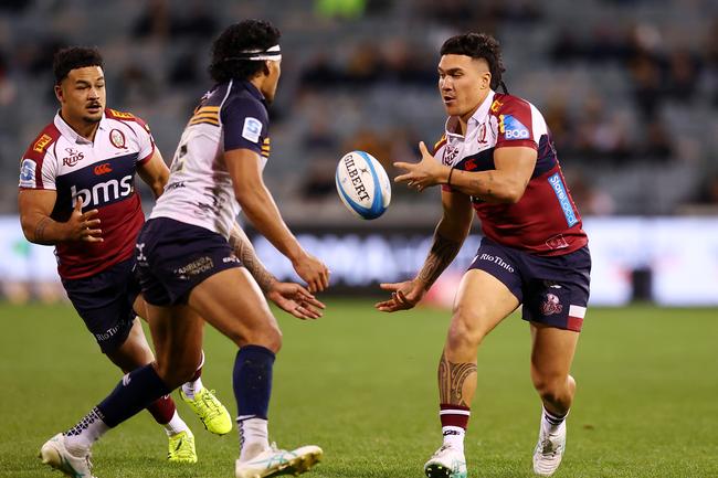 Dre Pakeho of the Reds passes during the round fourteen Super Rugby Pacific match between Brumbies and Reds at GIO Stadium, Photo by Mark Nolan/Getty Images.