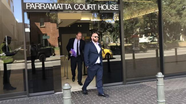 Solicitor Hassan Hallak (no tie) leaves Parramatta Local Court on Thursday.