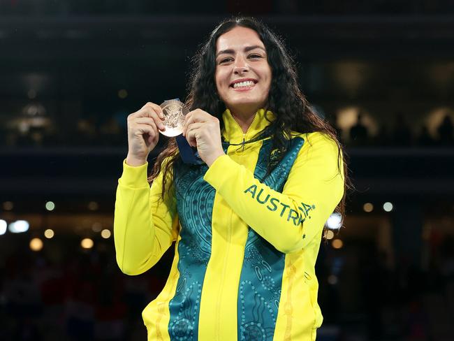 PARIS, FRANCE - AUGUST 10: Bronze Medallist Caitlin Parker of Team Australia poses on the podium during the Boxing Women's 75kg medal ceremony after the Boxing Women's 75kg Final match on day fifteen of the Olympic Games Paris 2024 at Roland Garros on August 10, 2024 in Paris, France. (Photo by Richard Pelham/Getty Images)