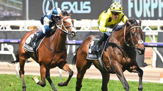 MELBOURNE, AUSTRALIA - NOVEMBER 07: Mark Zahra riding Without A Fight winning Race 7, the Lexus Melbourne Cup,  during Melbourne Cup Day at Flemington Racecourse on November 07, 2023 in Melbourne, Australia. (Photo by Vince Caligiuri/Getty Images)