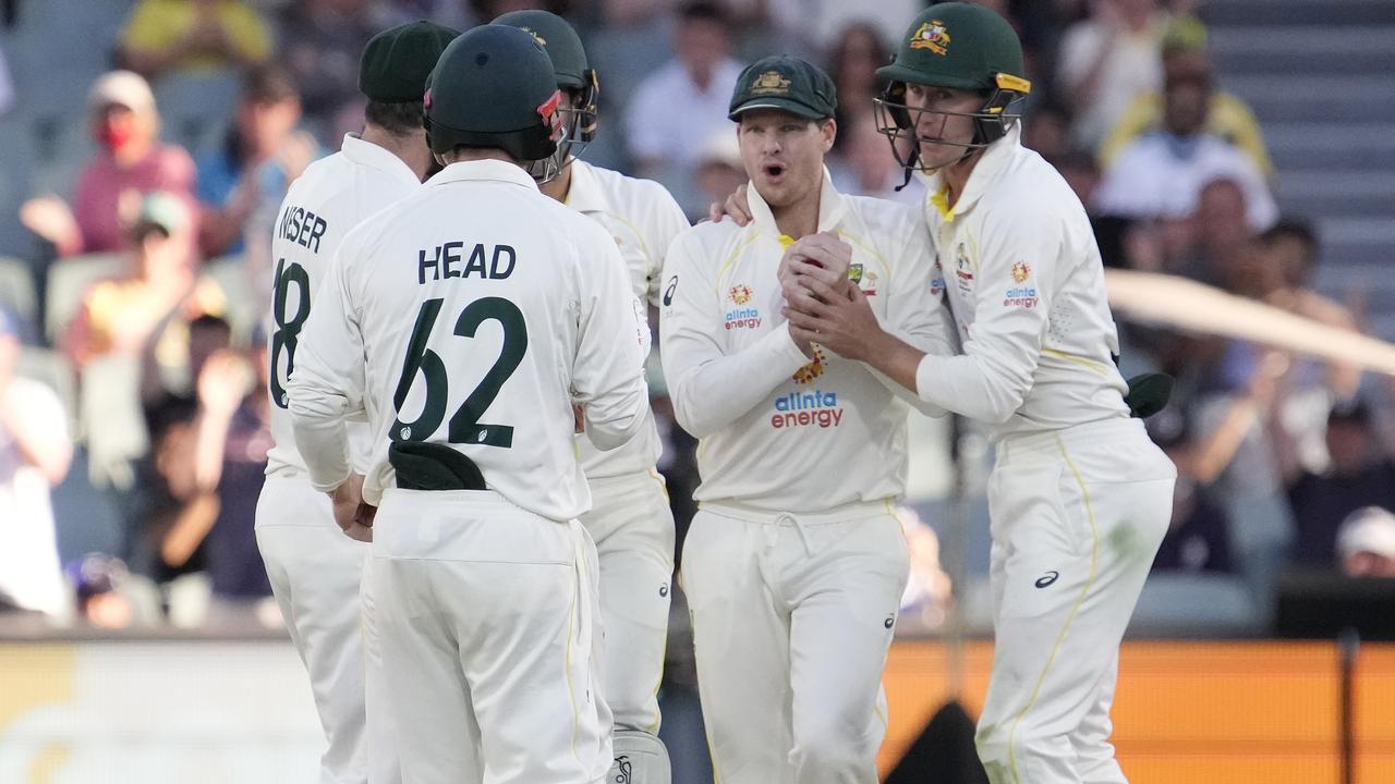 Smith celebrates with teammates after taking a catch to dismiss Ollie Robinson. Picture: Getty Images