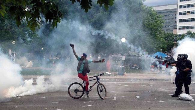 Police pepper spray a demonstrator in Colorado. Picture: AFP