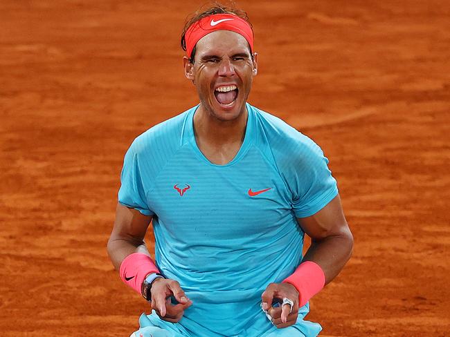 PARIS, FRANCE - OCTOBER 11: Rafael Nadal of Spain celebrates after winning championship point during his Men's Singles Final against Novak Djokovic of Serbia on day fifteen of the 2020 French Open at Roland Garros on October 11, 2020 in Paris, France. (Photo by Julian Finney/Getty Images)