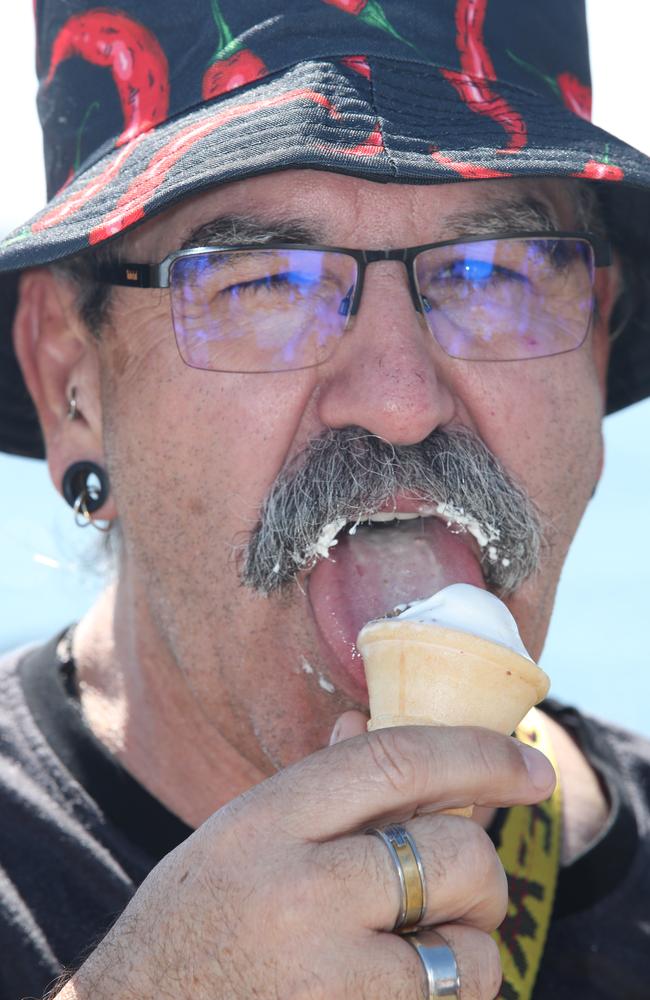 Huge crowds for the first day of the Gold Coast Show. John Loveridge enjoys his ice cream, and it shows. Picture: Glenn Hampson