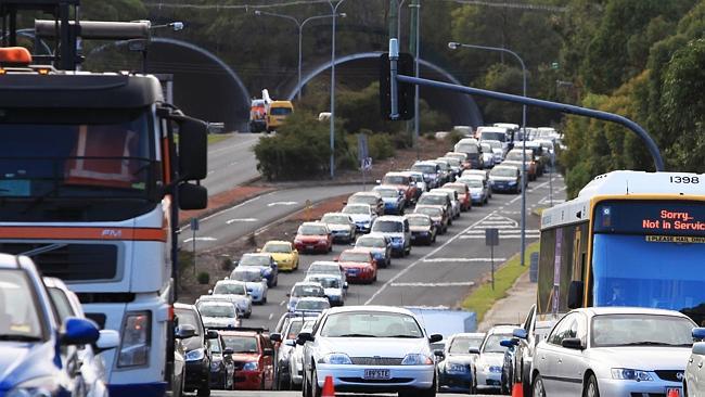 A small petrol tanker rollover on Compton Road near the Gateway Motorway merge caused traffic jams along the notorious stretch. Pic Tim Marsden