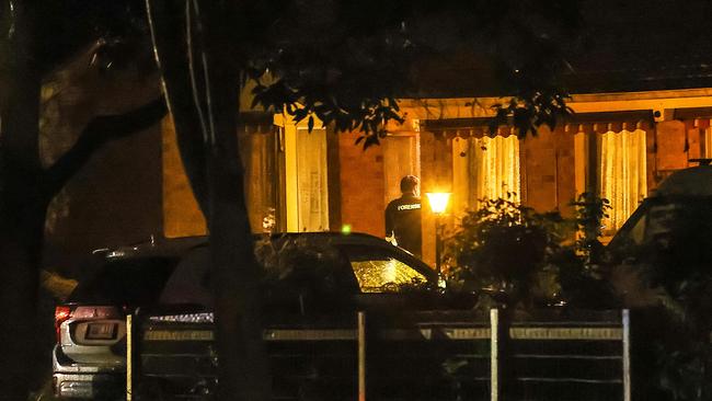 Forensic police enter a house in Huntingdon Ave, Bayswater North. Picture: Ian Currie