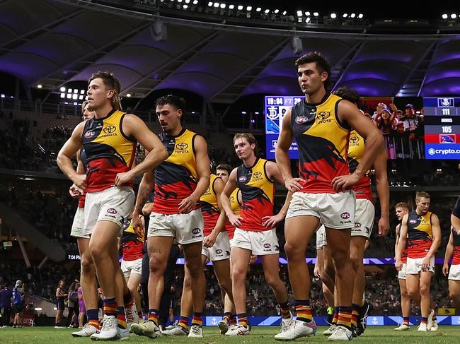 The Crows leave the field after the team’s defeat to the Dockers. Picture: Will Russell/AFL Photos via Getty Images.