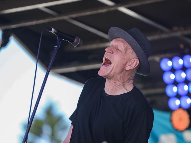 Former Labor federal government minister Peter Garrett performs at the Newcastle foreshore in support of the protesters. Picture: Roni Bintang/Getty Images