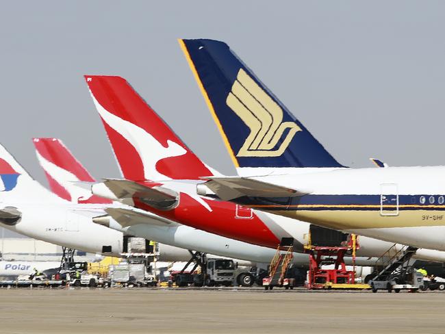 DO NOT USE, EMBARGO, HOLD COURIER MAIL FUTURE TOURISM CAMPAIGN Airside airplanes at the International Terminal of Brisbane Airport on Friday, August 30, 2019. (AAP Image/Claudia Baxter)