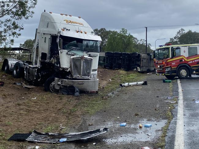 Three people remain in hospital after fatal Bruce Hwy truck vs ute crash