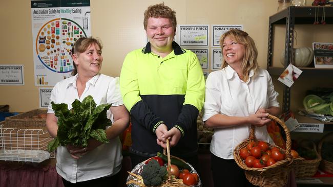 For Elaine Reeves. L-R Jody Clay Pantry Officer, Corey Barnes 20 of Gagebrook who volunteers, Gwen Harper Project Manager at The Pantry that forms part of Waterbridge Food Co-Op at Gagebrook Community Centre. Picture Nikki Davis-Jones