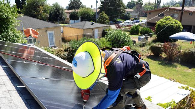 Australian households are rapidly deploying rooftop solar. Picture: AFP