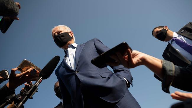 Democratic Presidential candidate Joe Biden speaks to the press art New Castle Airport in Delaware on September 23.