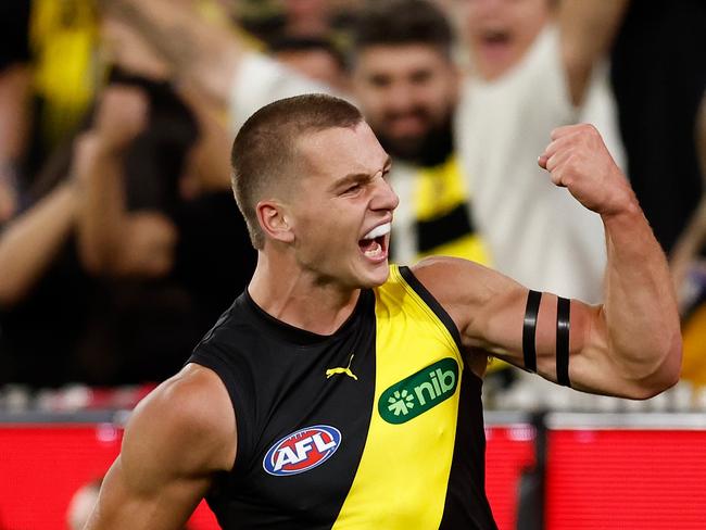 MELBOURNE, AUSTRALIA - MARCH 13: Debutant, Sam Lalor of the Tigers celebrates his first league goal during the 2025 AFL Round 01 match between the Richmond Tigers and the Carlton Blues at the Melbourne Cricket Ground on March 13, 2025 in Melbourne, Australia. (Photo by Michael Willson/AFL Photos via Getty Images)