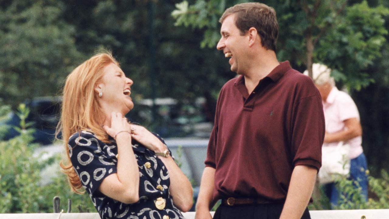 The exes sharing a laugh at a charity golf day in 1995, three years after their split. Picture: David Giles/PA/AFP