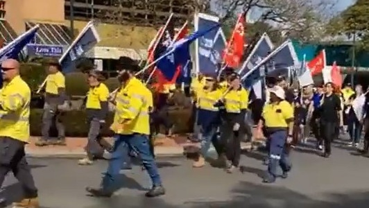 About 100 Gympie council workers walked off the job and marched down Mary St on Wednesday morning as long simmering tensions between the unions and the council’s management over a contentious pay battle finally boiled over.