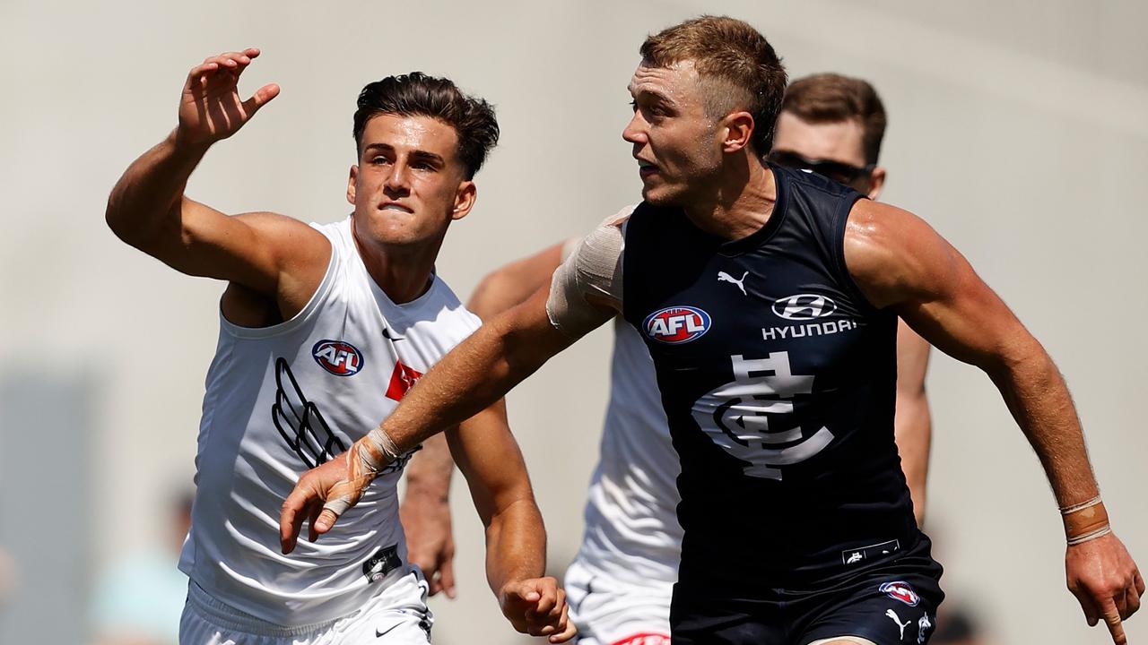 MELBOURNE, AUSTRALIA - FEBRUARY 24: Patrick Cripps of the Blues and Nick Daicos of the Magpies compete for the ball during the 2023 AFL match simulation between the Carlton Blues and the Collingwood Magpies at Ikon Park on February 24, 2023 in Melbourne, Australia. (Photo by Michael Willson/AFL Photos via Getty Images)