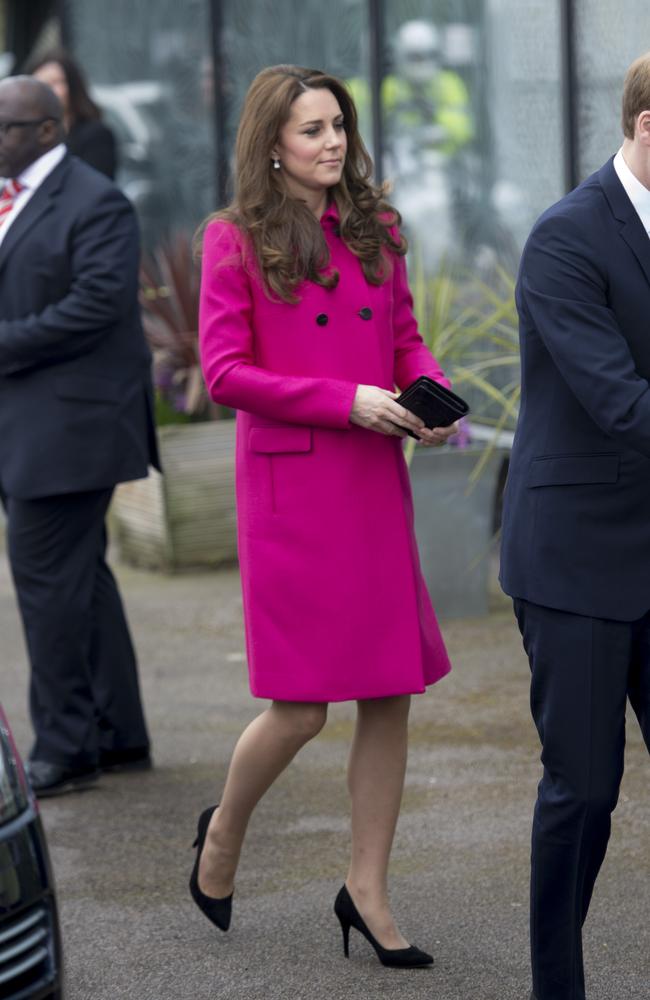 Can’t miss her ... The down-to-Earth Duchess - who, like the rest of us, knows the joy of getting a Topshop package in the mail - opted for a vibrant pink coat for the royal outing.