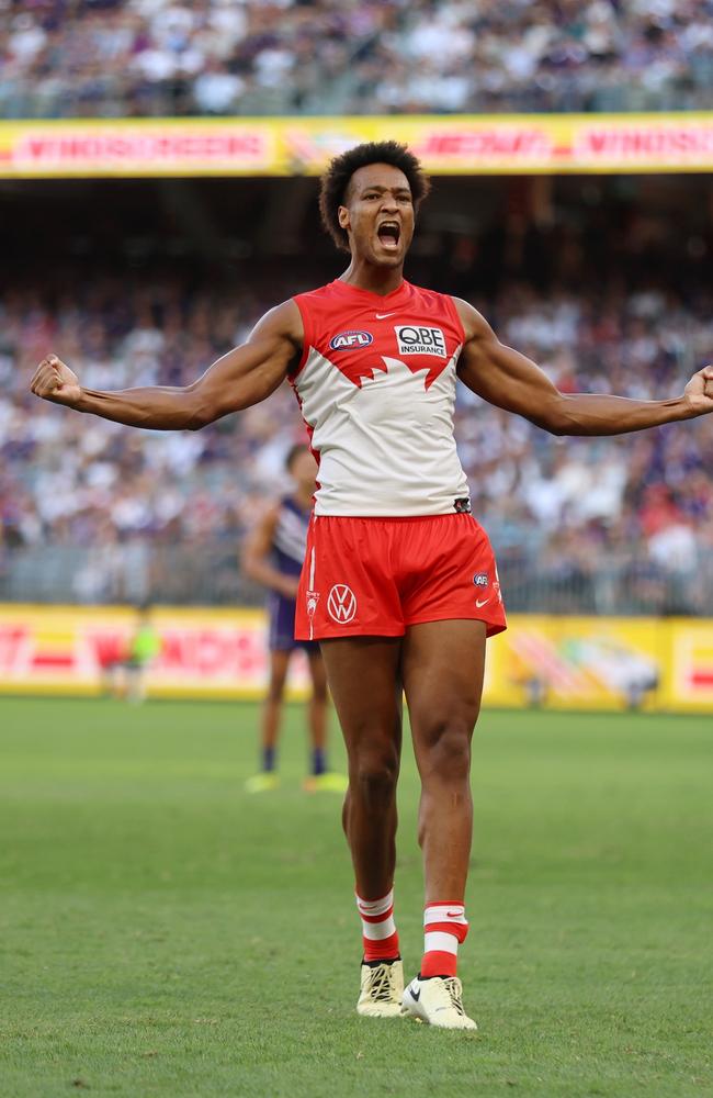 Joel Amartey celebrates putting the Swans in front on Sunday. Picture: Janelle St Pierre/AFL Photos via Getty Images.