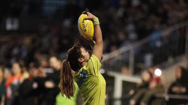 Rosemarie Michetti prepares to launch a throw-in.