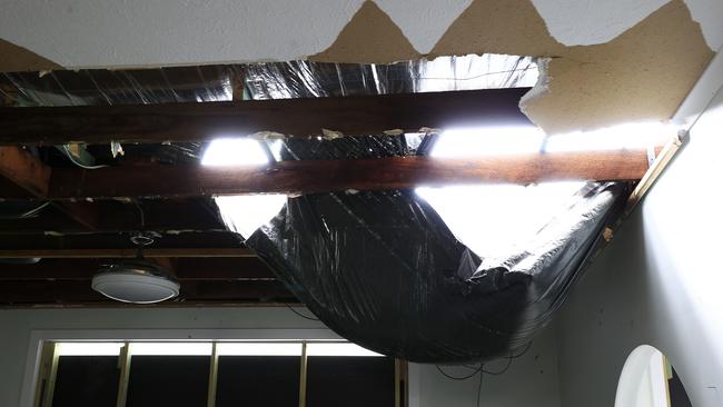 The roof of Bob Avery’s home was covered in tarp after the devastating Christmas Day Storms but the New Year’s downpour has left it caving in, flooding his home. Picture: Adam Head