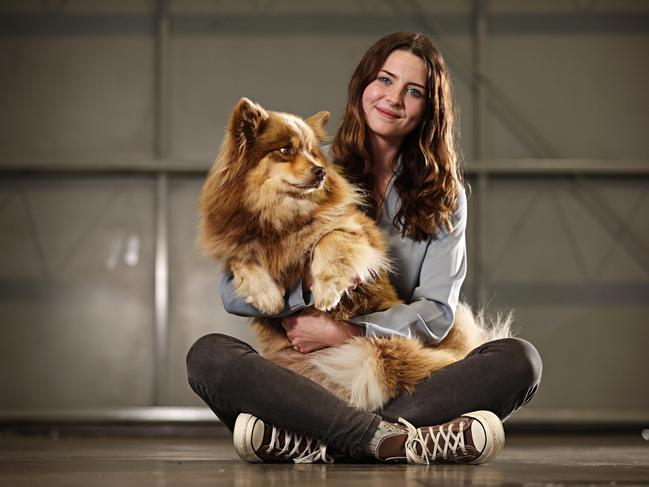 THE AUSTRALIAN AUGUST 27, 2023. Abbey-Rose Powell with Ruska (3) the Finnish Lapphund at the Sydney Dog Lovers and Cat Lovers Festival held in Sydney Showgrounds at Sydney Olympic Park. Picture: Adam Yip