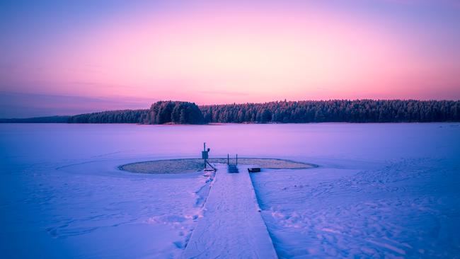 Only for the brave: an ice swimming hole in Kuhmo, Finland.