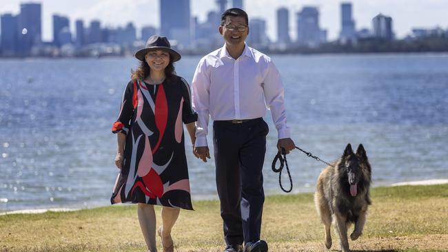 Sam Lim, Labor's candidate for the Federal seat of Tangney, with his wife Chew Yong and Bruno his dog at Applecross. Picture: Colin Murty