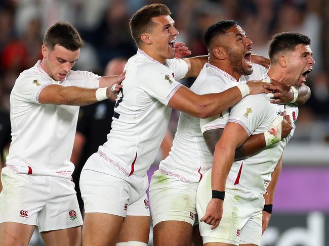 YOKOHAMA, JAPAN - OCTOBER 26:  Ben Youngs of England celebrates with team-mates Manu Tuilagi, Henry Slade and George Ford after scoring a disallowed try during the Rugby World Cup 2019 Semi-Final match between England and New Zealand at International Stadium Yokohama on October 26, 2019 in Yokohama, Kanagawa, Japan. (Photo by Shaun Botterill/Getty Images)