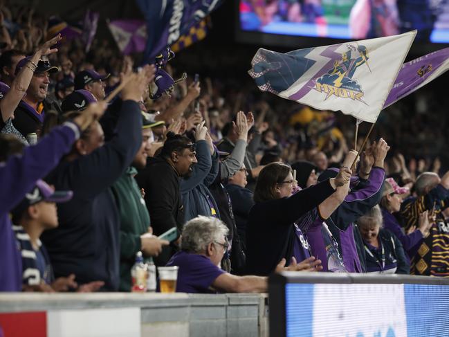 MELBOURNE, AUSTRALIA - AUGUST 24: Storm fans shot support during the round 25 NRL match between Melbourne Storm and Dolphins at AAMI Park, on August 24, 2024, in Melbourne, Australia. (Photo by Daniel Pockett/Getty Images)