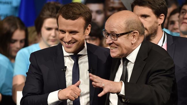 French President Emmanuel Macron with Mr Le Drian. Picture: AFP