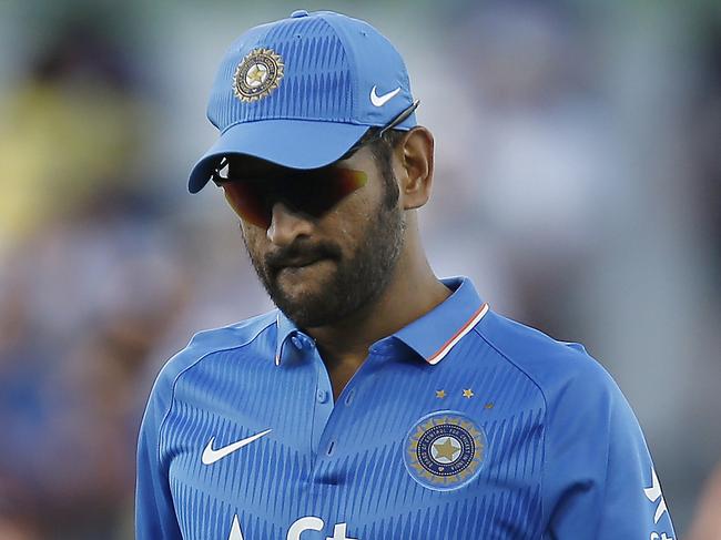 India's MS Dhoni walks back to his wicket keeping position during their one day international cricket match against Australia, in Perth, Australia, Tuesday, Jan. 12, 2016. (AP Photo/Theron Kirkman)