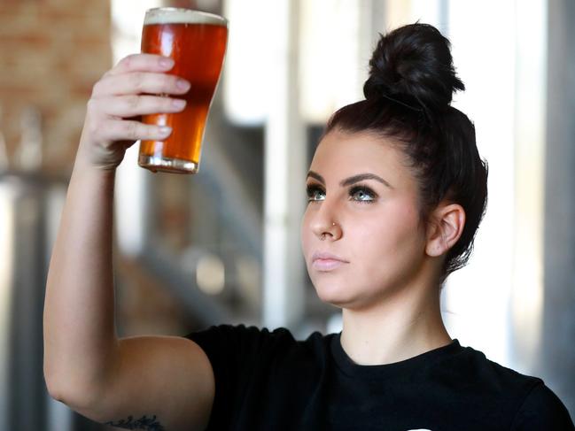 Australian Hotel and Brewery trainee brewer 21 year old Billie Bassett pose for photographs in Rouse Hill. Rouse Hill, Friday, August 17th 2018. Billie Bassett is the brewery's first female brewer. (AAP Image / Angelo Velardo)