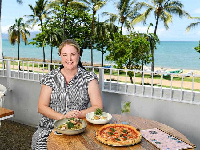 Holly Newman enjoys the view from the first level of Anelay on the Strand, prior to renovations. Picture: Shae Beplate.