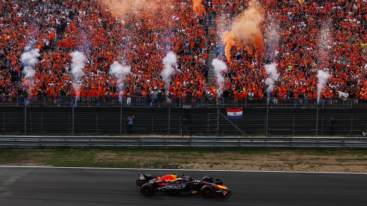 Max Verstappen of the Netherlands waves to his home crowd after winning the 2022 Dutch Grand Prix. Photo: Lars Baron.