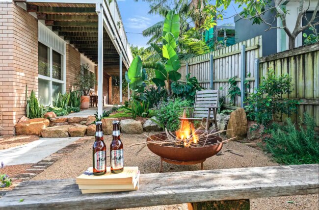 This Airbnb has an outdoor fire pit, making it ideal for sharing a yarn and a beverage. Picture: Airbnb