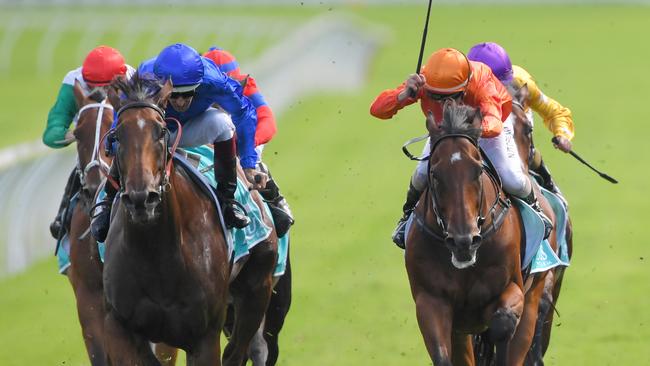 Hugh Bowman rides Alizee (second left) to victory in the Aquis Apollo Stakes. Picture: AAP/Simon Bullard