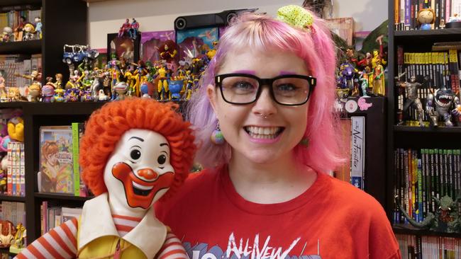 Cazz Jennings, aka Nerd Burger, with her McDonalds collection. Picture: Supplied.