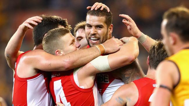 Lance Franklin is congratulated by teammates after kicking a goal. Picture: Getty Images
