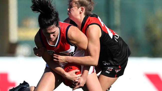 Darebin draftee Gabby Colvin is tackled by Maddy Collier.