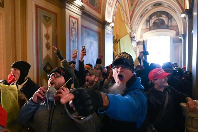 Supporters of US President Donald Trump protest inside the US Capitol. Demonstrators breeched security and entered the Capitol as Congress debated the a 2020 presidential election Electoral Vote Certification. Picture: ROBERTO SCHMIDT / AFP