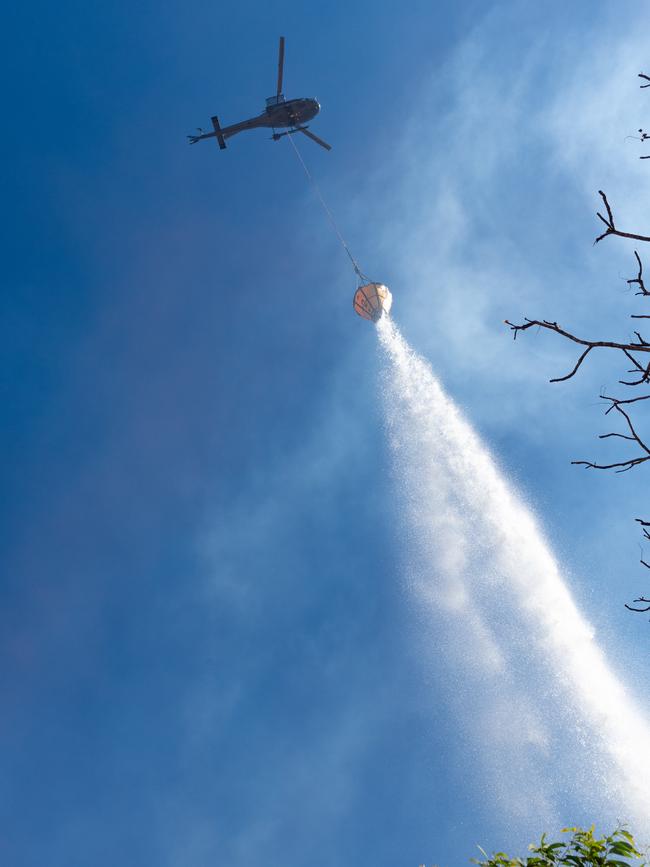 A bushfire ripped through the Livingstone area this afternoon, threatening local properties. Picture: Che Chorley