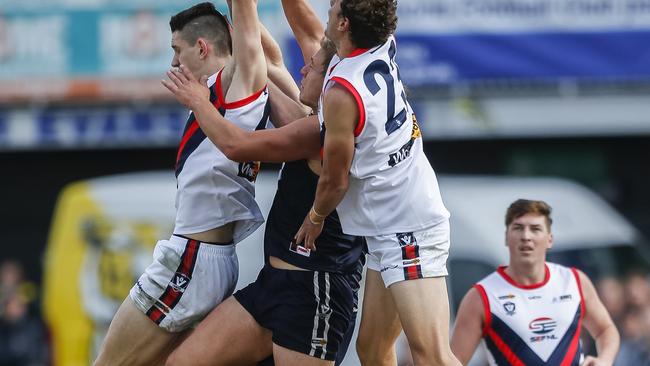 Interleague rivals last year, AFL Yarra Ranges and SEFNL players will do battle in the same competition this year  Picture: Valeriu Campan