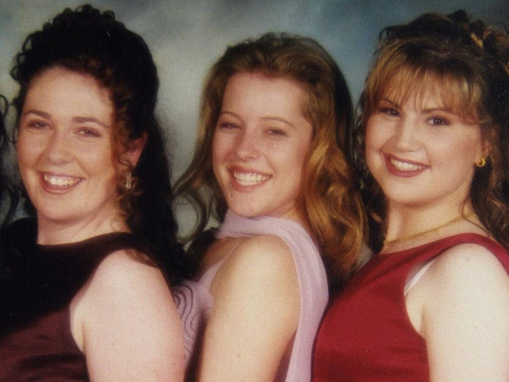 Rachelle Childs, flanked by school friends in an undated, was murdered in June 2001.